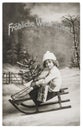 Little girl sled Christmas tree Nostalgic vintage picture