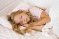 Little girl sleep in the bed close-up Royalty Free Stock Photo