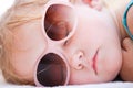 Little girl sleeping at beach Royalty Free Stock Photo