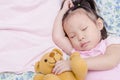 Little girl sleeping on bed Royalty Free Stock Photo