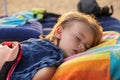 A little girl sleep on the beach Royalty Free Stock Photo