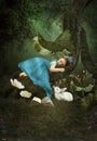 Little girl sleeping in forest Royalty Free Stock Photo
