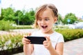 Little girl with a smartphone Royalty Free Stock Photo