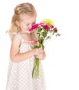 Little girl smelling flowers Royalty Free Stock Photo