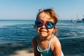 Little girl smiling on a beach Royalty Free Stock Photo