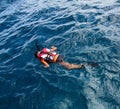 Little girl snorkeling in ocean Royalty Free Stock Photo