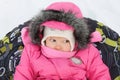 Little girl in snow tube. Winter tubing. Winter leisure activity concept. Family winter fun Royalty Free Stock Photo