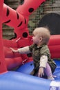 Little girl with soother on moonwalk