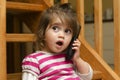 Little girl speak on the phone