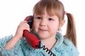 The little girl speaks by phone