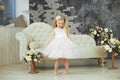 Little girl are spining in white luxury dress Royalty Free Stock Photo