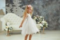 Little girl are spining in white luxury dress Royalty Free Stock Photo