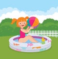 Little girl splashing in an inflatable pool in his backyard