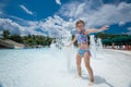 Little girl splashing water