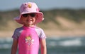 Little Girl standing on the beach Royalty Free Stock Photo