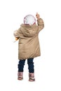 A little girl standing with his back pointing her finger. Royalty Free Stock Photo