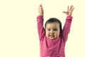 Little girl standing and holds hands up Royalty Free Stock Photo