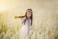 Little girl standing on meadow with sunset , outdoor in nature Royalty Free Stock Photo