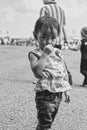 Cute and shy little girl staring at camera, Bandung Air Show 2017 Royalty Free Stock Photo