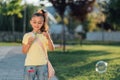 Little girl is staying in the park