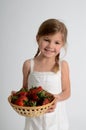 Little girl with strawberries Royalty Free Stock Photo