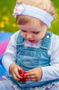 Little girl with strawberry Royalty Free Stock Photo