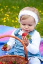 Little girl with strawberry Royalty Free Stock Photo