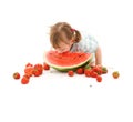 Little girl with strawberry and watermelon Royalty Free Stock Photo