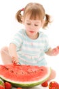 Little girl with strawberry and watermelon Royalty Free Stock Photo