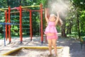 Little girl in stylish dress and sunglasses Royalty Free Stock Photo