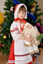 The little girl in a suit of the Little Red Riding Hood with toy Royalty Free Stock Photo