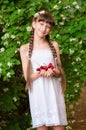 Little girl with summer cherries Royalty Free Stock Photo