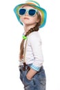 A little girl in a summer panama, denim overalls and sunglasses.