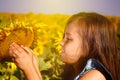 Little girl with a sunflower Royalty Free Stock Photo