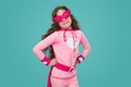 Little girl in superhero outfit and mask Royalty Free Stock Photo