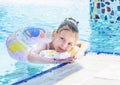 Little girl swiming in the pool Royalty Free Stock Photo