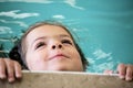 Little girl swimming Royalty Free Stock Photo