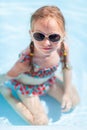 Little girl at swimming pool Royalty Free Stock Photo