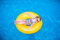 Little girl in swimming pool on inflatable ring Royalty Free Stock Photo