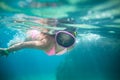 LIttle girl swimming underwater in the sea Royalty Free Stock Photo