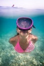 LIttle girl swimming underwater in the sea Royalty Free Stock Photo