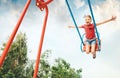 Little girl swing on swing Royalty Free Stock Photo