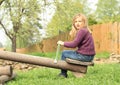 Little girl on a swing