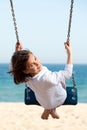Little girl swinging Royalty Free Stock Photo