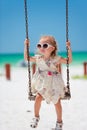 Little girl swinging Royalty Free Stock Photo