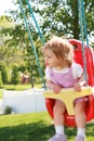 Little Girl Swinging Royalty Free Stock Photo