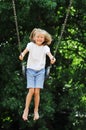 Little girl swinging Royalty Free Stock Photo