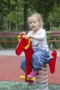 Little girl swinging Royalty Free Stock Photo