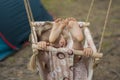 Little girl swinging on a swing. Child`s feet. Baby having fun. Camping life with a child. Royalty Free Stock Photo