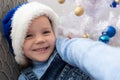 Little girl takes a selfie on Christmas Day